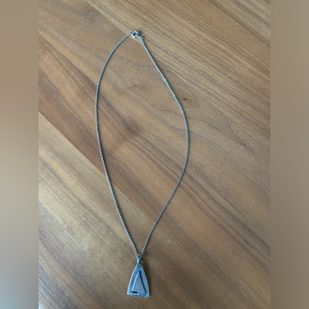1975 Canadian Handmade 12mm pewter sloop pendant on silver chain.
